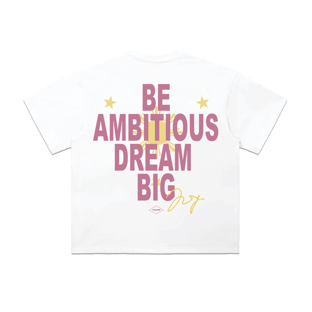 Heavyweight white cotton T-shirt featuring Alex Eala celebrating in front of the Philippine sun and stars on the front, with a bold "Be Ambitious. Dream Big." graphic across the back in pink typography, creating an inspiring Filipino tennis streetwear design.