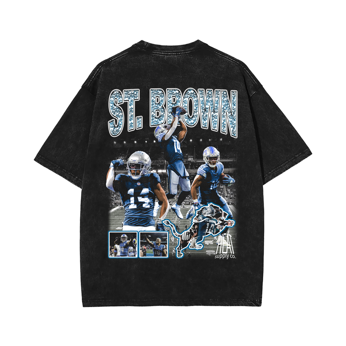 Black oversized t-shirt featuring multiple action shots of Amon-Ra St. Brown, a wide receiver for the Detroit Lions. The text 'ST. BROWN' is printed across the top with a lion mascot graphic and additional player images below