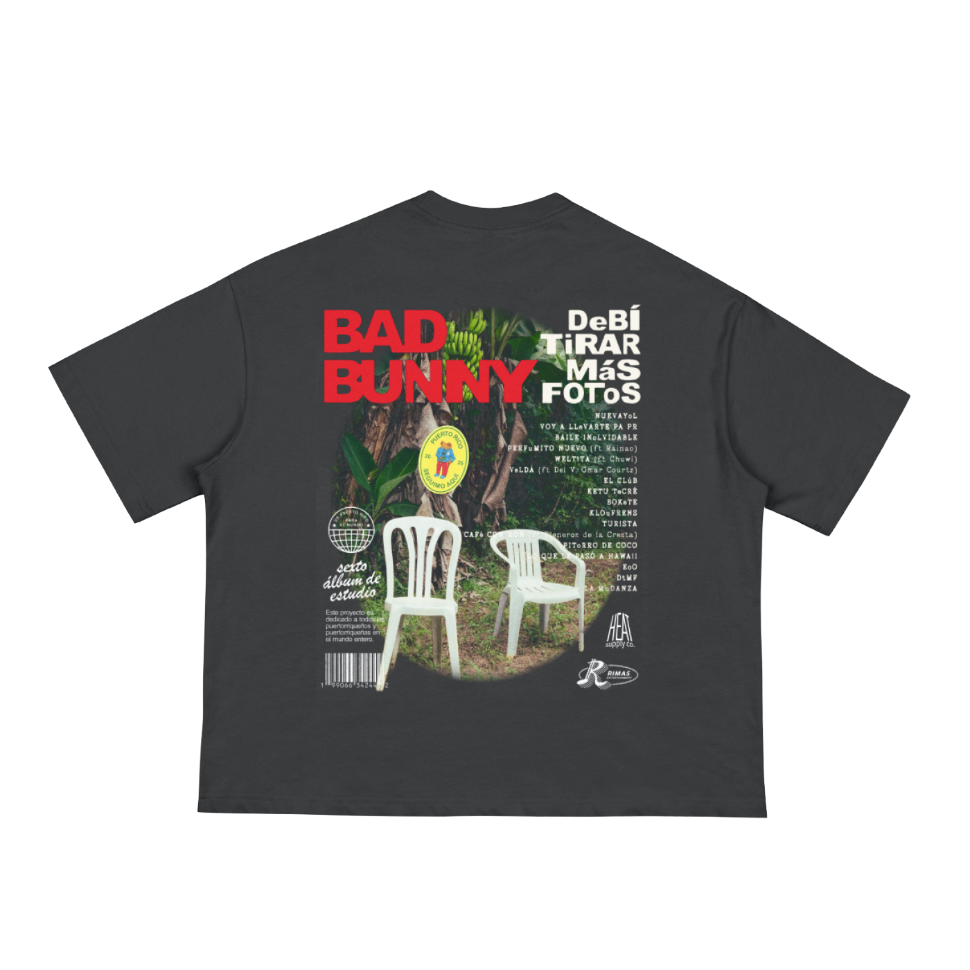 Black boxy-fit T-shirt featuring a bold graphic design on the back with 'Bad Bunny' in red text and 'Debí Tirar Más Fotos' in white text, accompanied by a nature-inspired image with white plastic chairs and tropical greenery. The front of the tee displays 'Debí Tirar Más Fotos' in white text across the chest. Designed with a loose, drop-shoulder fit and half sleeves.