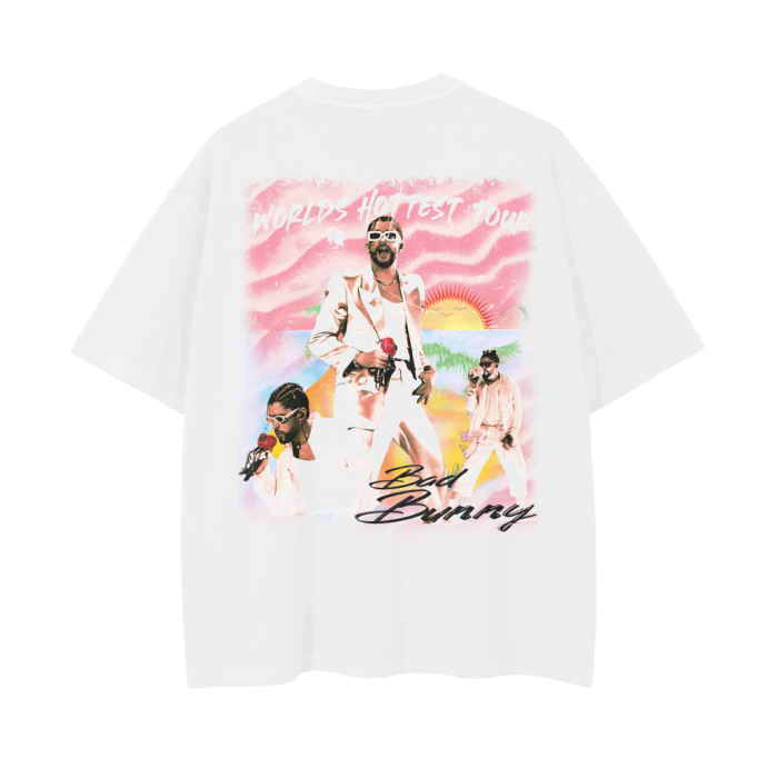 White t-shirt featuring Bad Bunny in various stylish poses, with a background of a sunset and palm trees and text reading 'World's Hottest Tour.