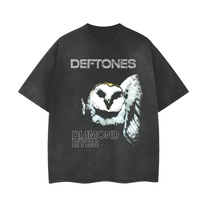 Black oversized t-shirt with a large graphic of an owl in flight, representing the album 'Diamond Eyes' by Deftones. The band's name 'Deftones' and the album title 'Diamond Eyes' are printed in bold gray text above and below the owl graphic.