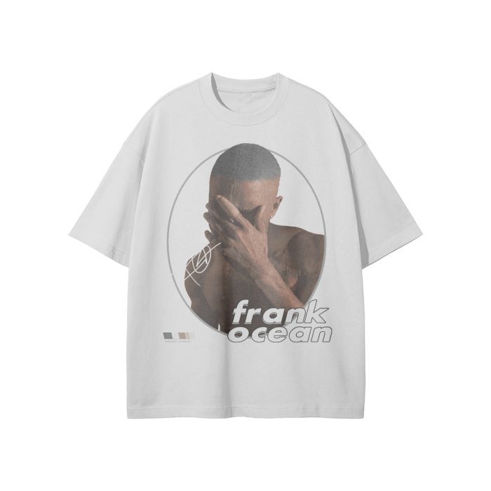An Oat Grey-colored oversized t-shirt with a minimalist graphic design showing Frank Ocean covering his face with his hand. The design includes circular outlines around the image, with "frank ocean" written in a sleek font below.