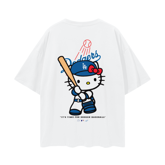 A white T-shirt featuring an illustration of Hello Kitty dressed in a Los Angeles Dodgers uniform holding a baseball bat, with the Dodgers logo above her and the phrase "It's Time For Dodger Baseball!" below.