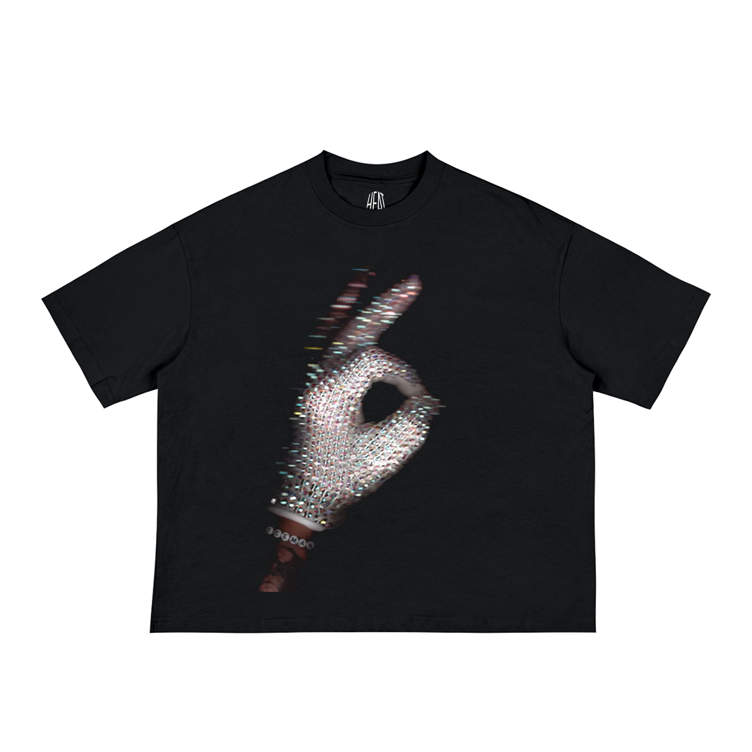 Black oversized loose-fit cotton T-shirt featuring a rhinestone-covered glove forming an “OK” hand gesture with a subtle glitch effect, inspired by Drake’s “Ice Man” aesthetic.