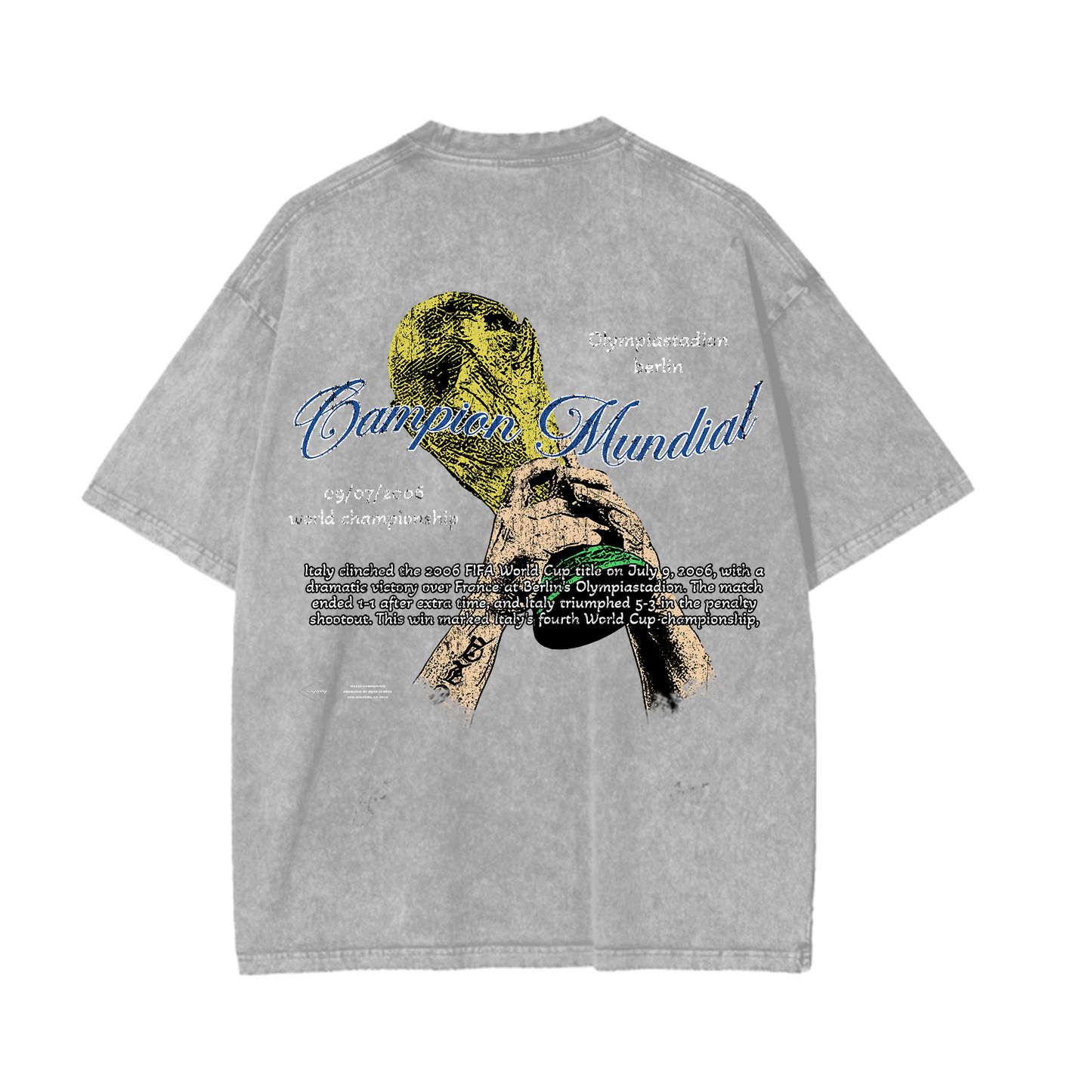 The back of a black acid wash T-shirt featuring the World Cup trophy with the text "Champion Mundial" in cursive. Below the trophy is a description of Italy's 2006 World Cup victory at Berlin's Olympiastadion, with subtle faded details that enhance the shirt’s vintage look.