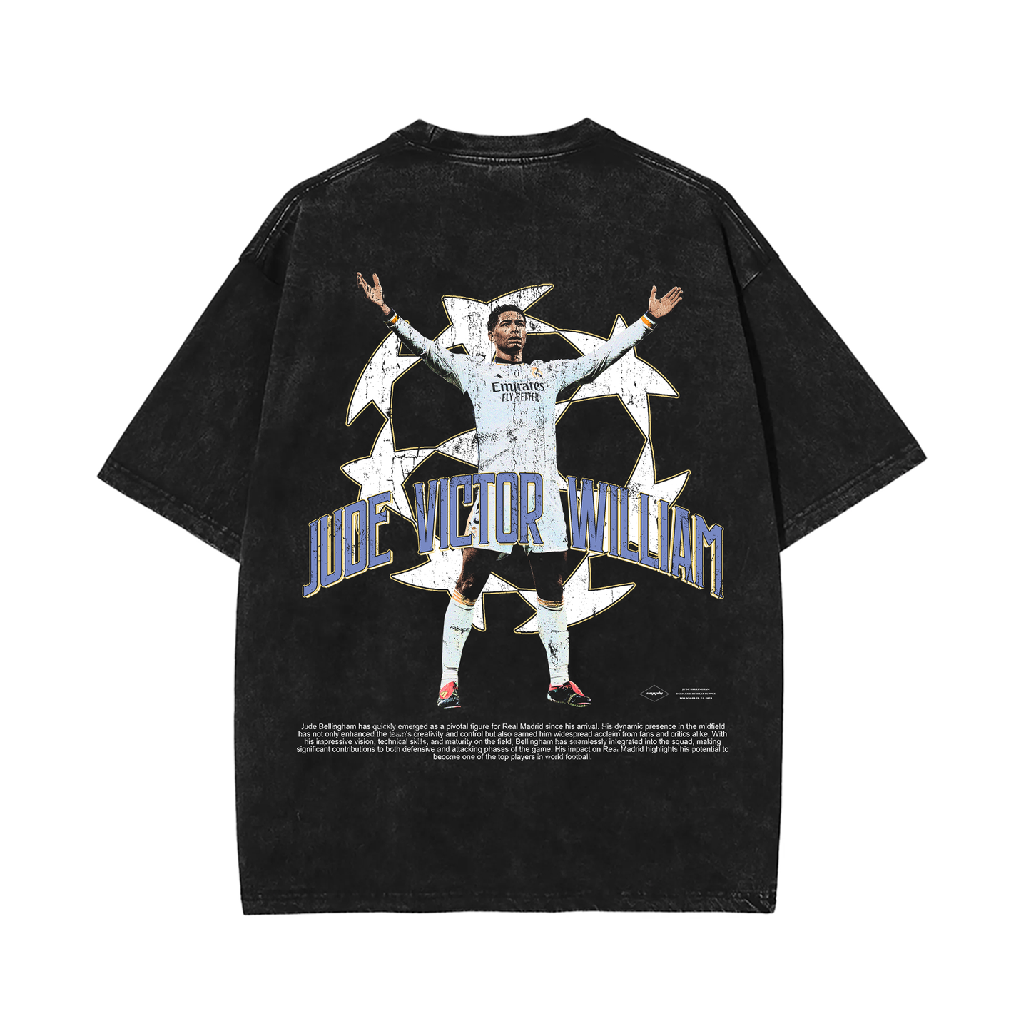 The back of the oversized vintage wash tee showcases a large graphic of Jude Bellingham celebrating with his arms outstretched, surrounded by a stylized soccer ball design, along with his full name, "Jude Victor William," in bold text, completing the striking look of this Real Madrid tribute tee.