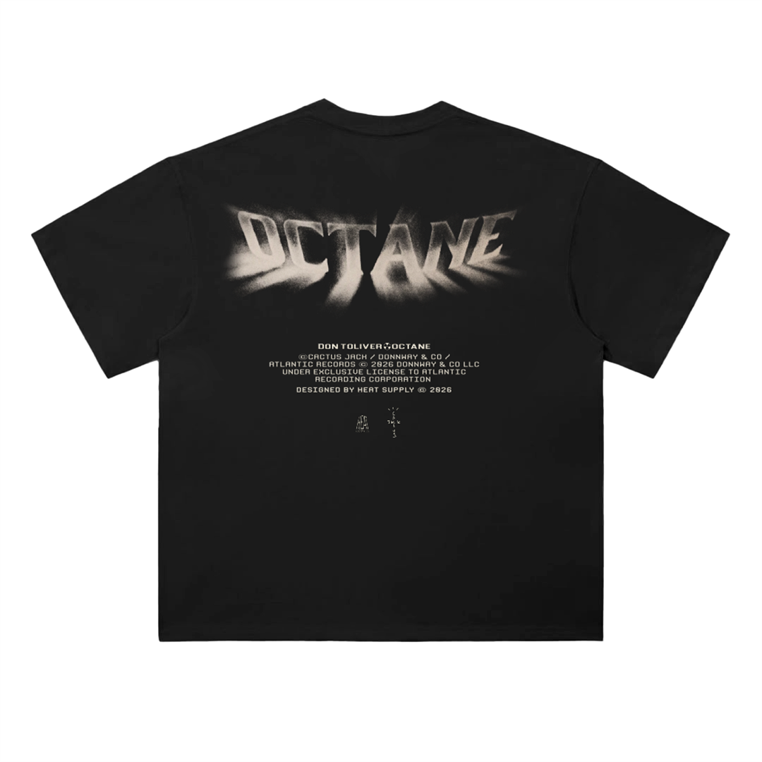 Black heavyweight drop shoulder T-shirt with large distressed spray-style “OCTANE” text across the upper back and smaller white text underneath referencing Don Toliver and Octane.