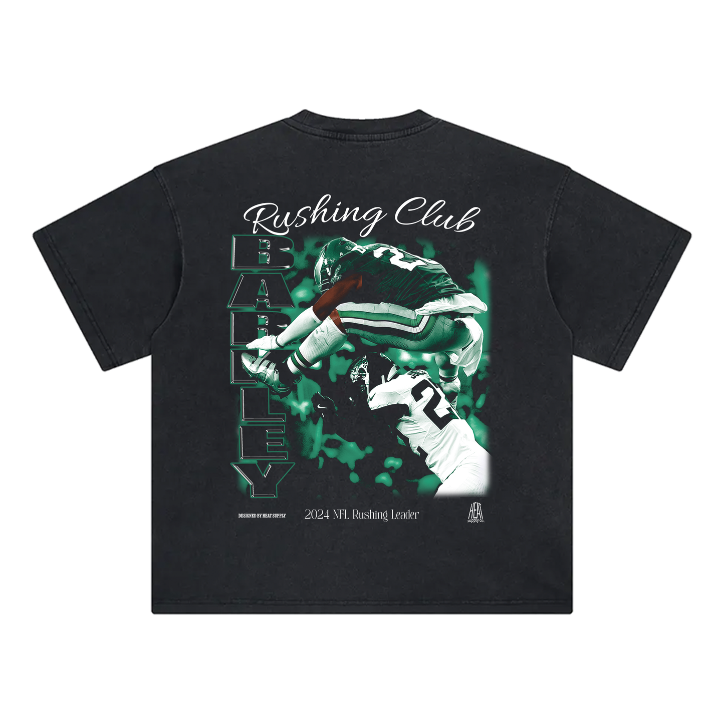 Black washed oversized T-shirt featuring a dynamic back design with 'Rushing Club' in elegant script at the top. The centerpiece showcases Saquon Barkley hurdling a defender in an Eagles uniform, with his last name 'Barkley' written vertically in bold green text. The bottom text highlights '2024 NFL Rushing Leader,' making it a statement piece for fans.