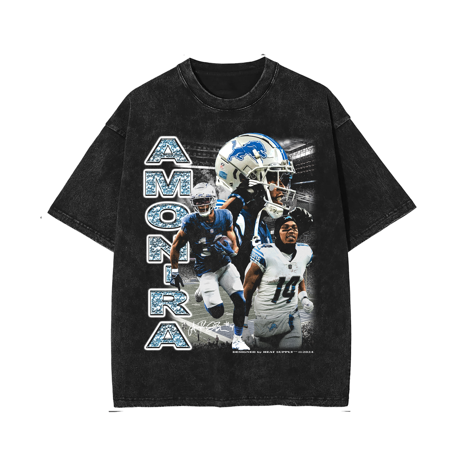 Black oversized t-shirt with images of Amon-Ra St. Brown in various action poses as a wide receiver for the Detroit Lions. The text 'AMON-RA' is printed vertically on the left, with the Detroit Lions helmet and logo included
