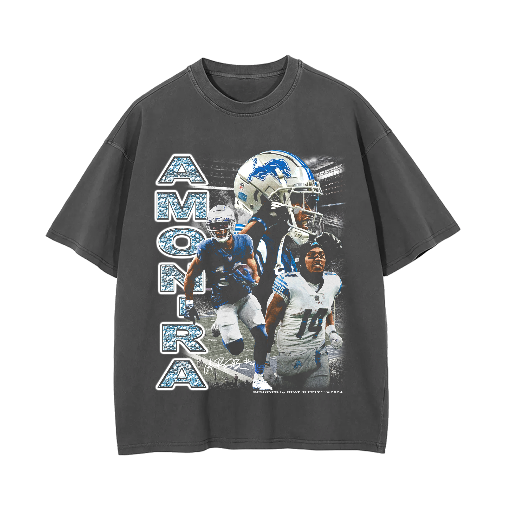 Grey oversized t-shirt with images of Amon-Ra St. Brown in various action poses as a wide receiver for the Detroit Lions. The text 'AMON-RA' is printed vertically on the left, with the Detroit Lions helmet and logo included