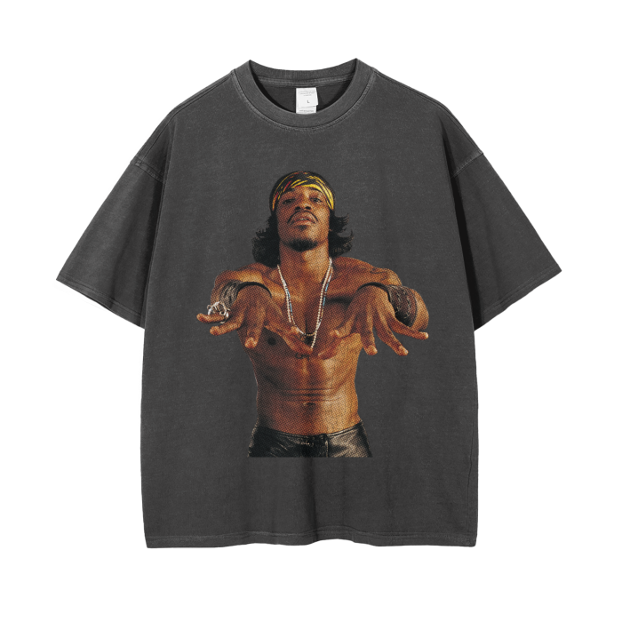 Retro Black-colored oversized t-shirt featuring a large image of André 3000, shirtless, with a confident pose and wearing a headband, necklaces, and bracelets. The image captures his distinctive style and charismatic personality.