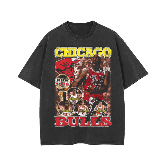 Vintage-style oversized black t-shirt with a Chicago Bulls 1996 NBA Championship design, showcasing Michael Jordan, Scottie Pippen, Dennis Rodman, and other team members in a bold, colorful collage