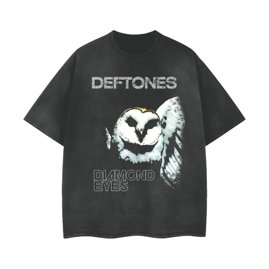 Black oversized t-shirt with a large graphic of an owl in flight, representing the album 'Diamond Eyes' by Deftones. The band's name 'Deftones' and the album title 'Diamond Eyes' are printed in bold gray text above and below the owl graphic.