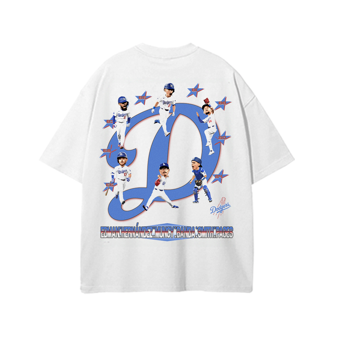 White unisex t-shirt with a bold blue “D” graphic in the center surrounded by cartoon-style Dodgers players in various poses, with player names listed along the bottom.