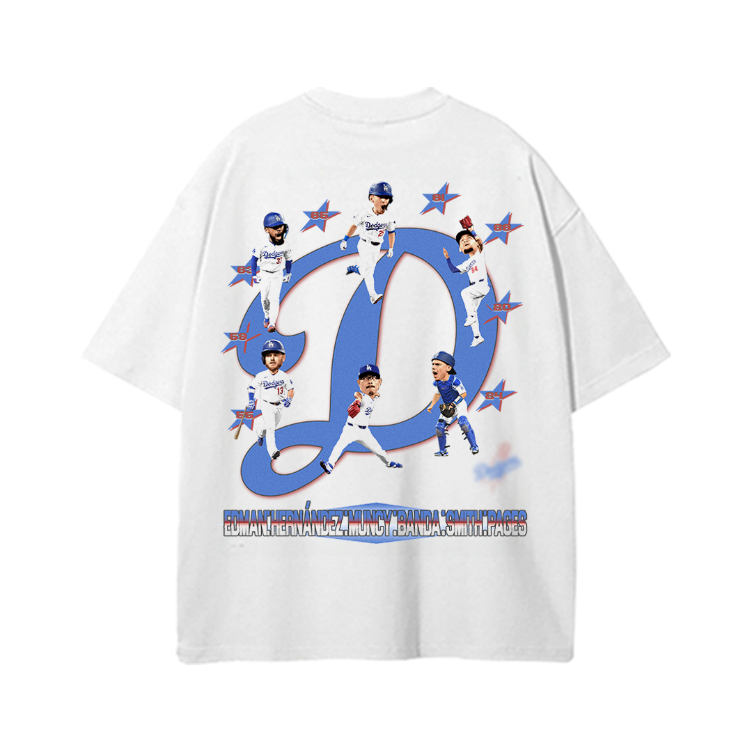 White unisex t-shirt with a bold blue “D” graphic in the center surrounded by cartoon-style Dodgers players in various poses, with player names listed along the bottom.