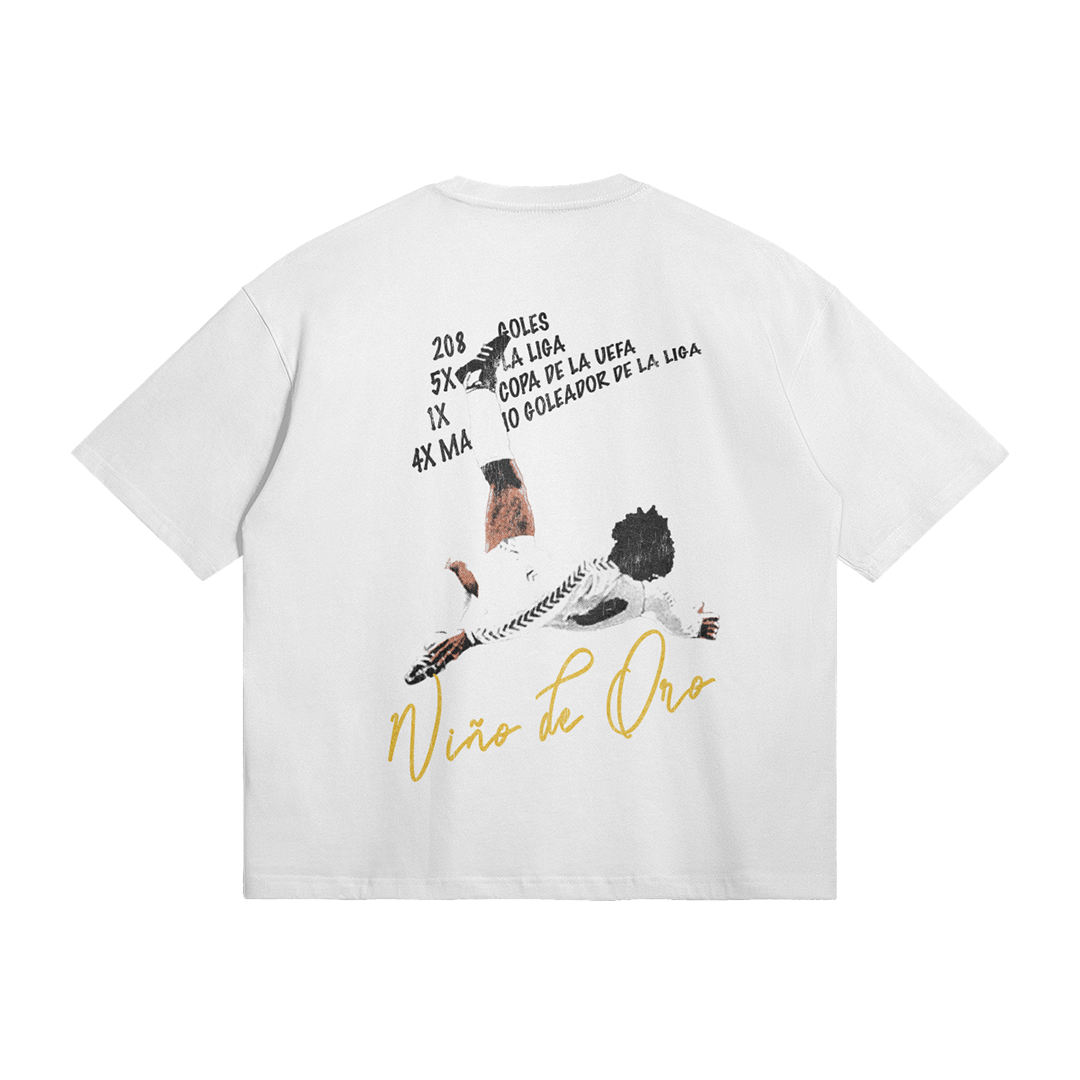 A white T-shirt displaying a graphic of Hugo Sánchez performing his iconic bicycle kick. Above, his career statistics are listed, and "Niño de Oro" is written in script font below