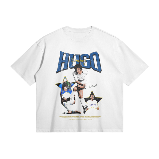 A white T-shirt featuring a large graphic of Hugo Sánchez in various action poses with the name "Hugo Sánchez" in bold letters at the top.