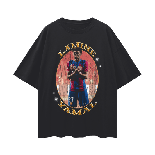 Black oversized Lamine Yamal T-shirt featuring a vibrant graphic of the Barcelona soccer player in his team jersey. Made from 100% cotton, this unisex, loose-fit tee is perfect for casual wear, blending soccer fandom with modern streetwear style.