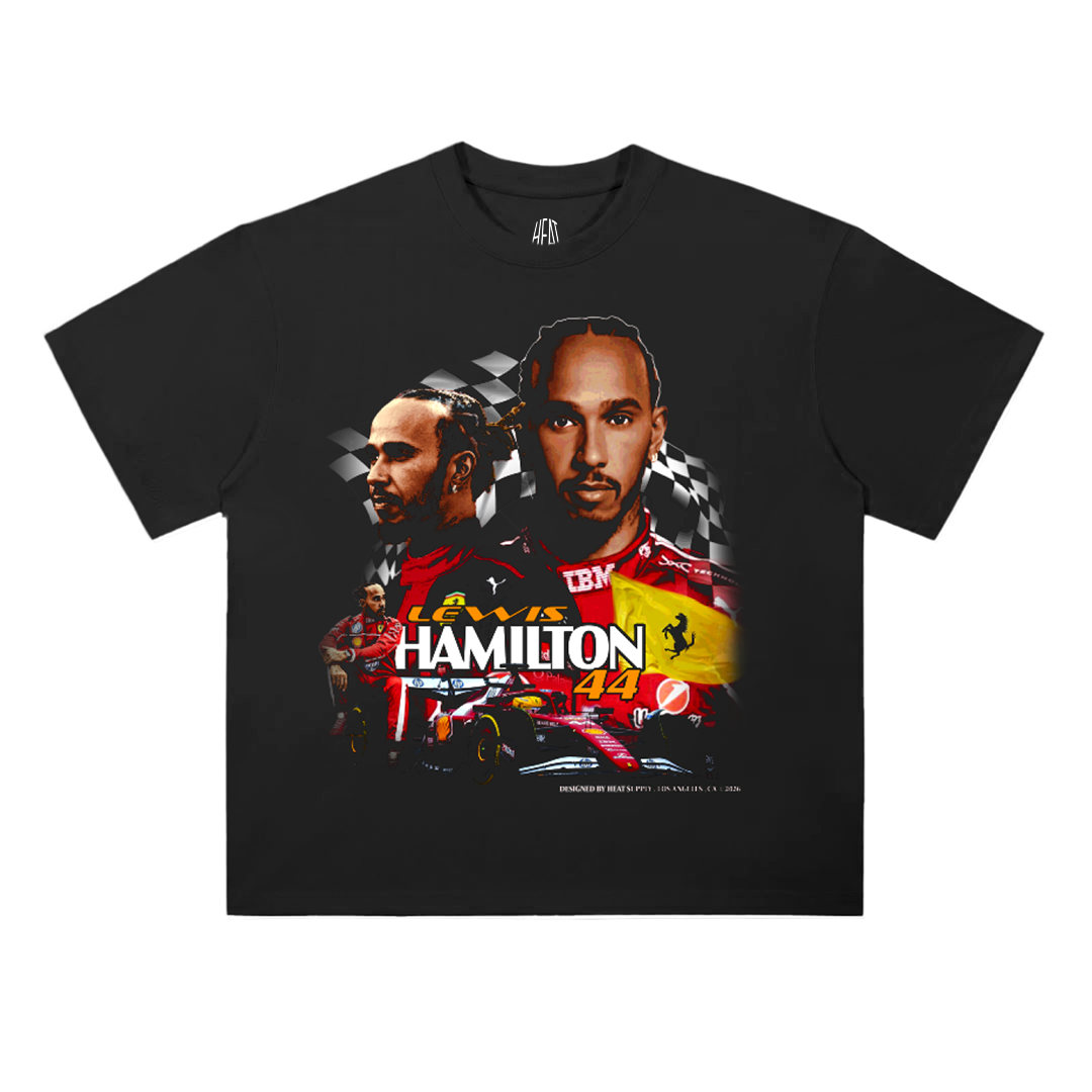 Black oversized cotton T-shirt featuring a graphic collage of Lewis Hamilton with racing imagery, Ferrari-style racecar, checkered flag background, and bold “Hamilton 44” text.