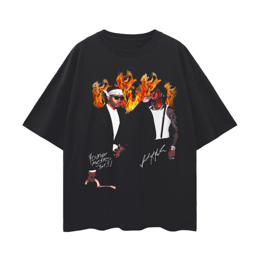 Black oversized T-shirt featuring Metro Boomin and Future with flames in the background. The artists are depicted wearing sunglasses and stylish outfits, with their signatures displayed below the images