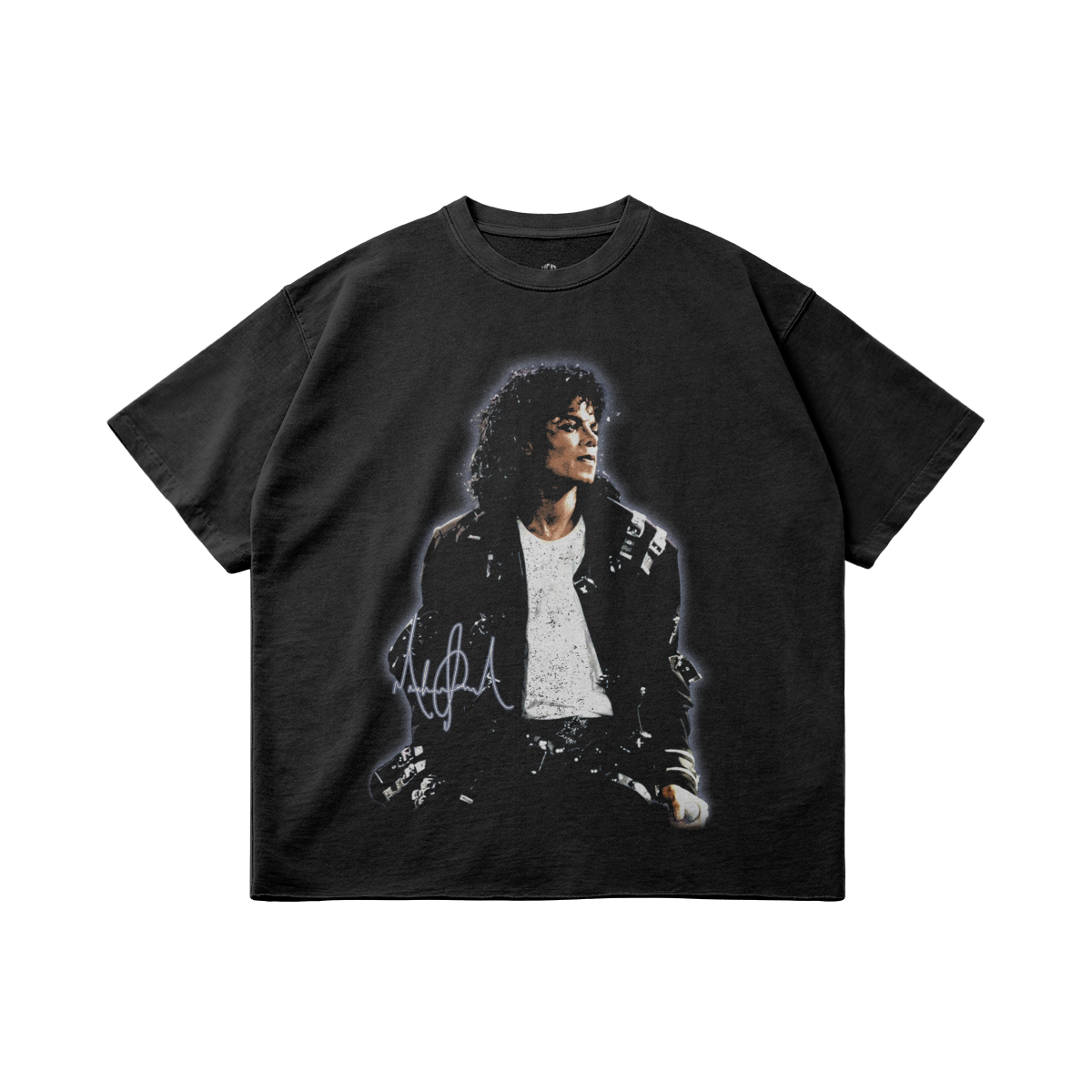 A black oversized t-shirt featuring a large graphic of Michael Jackson in his iconic "Bad" era look, with his signature and the text "King of Pop" above the image.