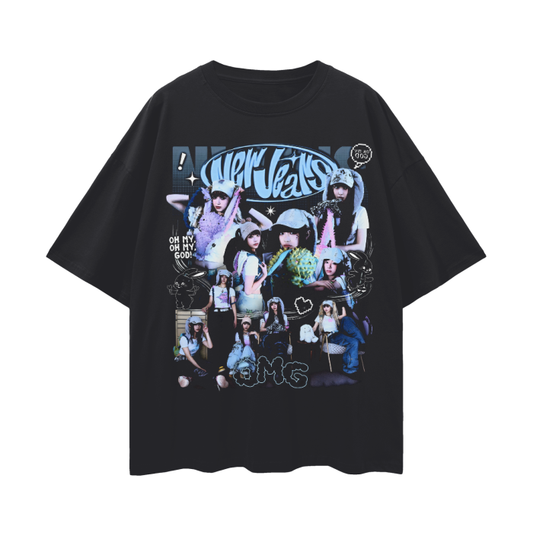 A black oversized t-shirt featuring a vibrant collage of the K-pop group NewJeans. The design showcases multiple images of the group members in a playful, retro-inspired style with shades of blue and purple. The group's name, "NewJeans," is displayed prominently in graffiti-style text at the top. Additional graphic elements like stars, speech bubbles with "OMG," and cartoonish doodles surround the images, giving the shirt a dynamic and energetic vibe, perfect for fans of the group.