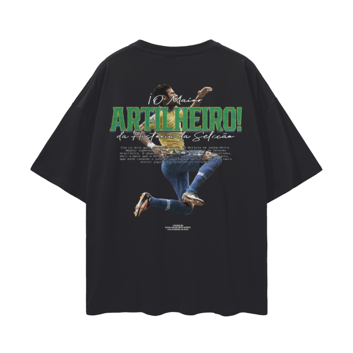 The back of a black oversized t-shirt showcasing Neymar Jr. performing a mid-air soccer kick. The text "O Maior Artilheiro da História da Seleção" is written in bold green letters, highlighting his accomplishment as the greatest scorer in Brazil's national team history.