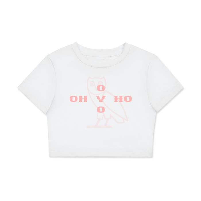 A white cropped t-shirt featuring a minimalist owl design in the center, with the text "OH V HO" arranged in a cross pattern using pink letters