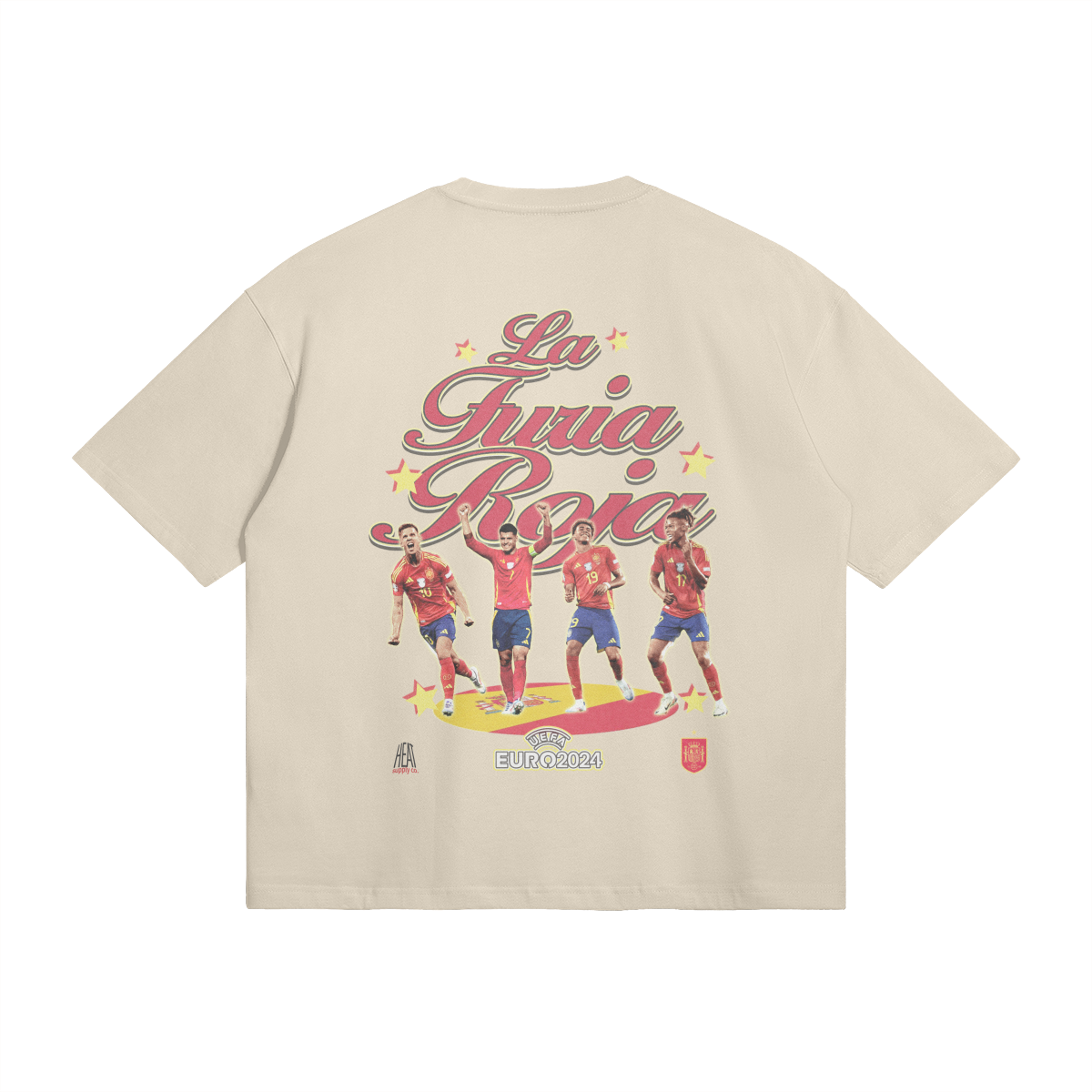  A beige oversized t-shirt featuring a graphic of four Spain national soccer team players celebrating, with the text "La Furia Roja" in bold, cursive red lettering above them. The design includes the UEFA Euro 2024 logo.