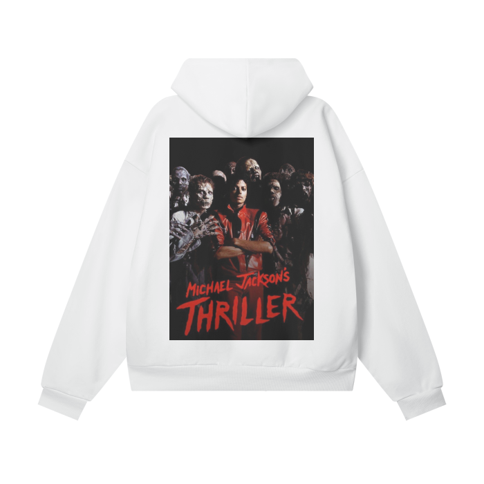A white oversized hoodie featuring a vibrant design on the back inspired by Michael Jackson's "Thriller." The design includes a central image of Michael Jackson in his iconic red jacket, surrounded by zombies. The text "Michael Jackson's Thriller" is written in bold red letters at the bottom of the image, capturing the essence of the legendary music video.